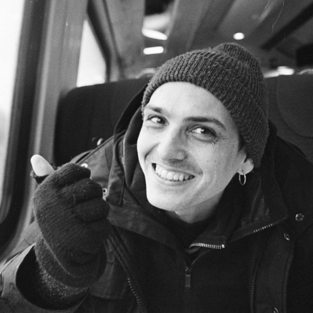 Photo of Billy Johnstone, website developer at queer web design, grinning